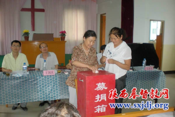延安市基督教界踊跃为陕南灾区捐款(图1)